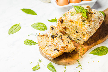 The appetizing cake filled with olives and feta cheese