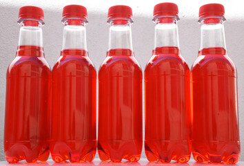 Red wine soda  drink bottles in white background