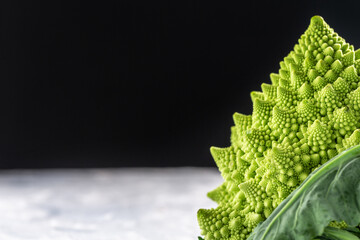 Romanesco broccoli close up. The fractal vegetable is known for it's connection to the fibonacci...