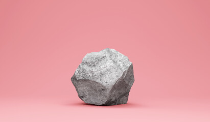 Heavy big stone on pink studio background - 393814410