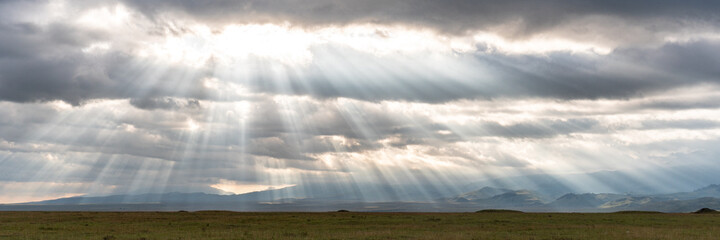 Fototapeta na wymiar sun beams in landscape Kyrgyzstan
