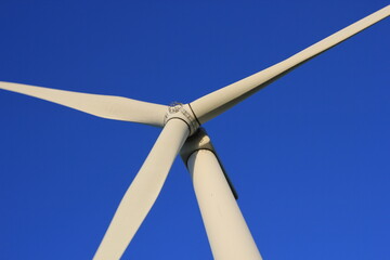 Wind farm turbines that produce electricity energy. Windmill Wind power technology productions Wind...