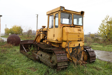 yellow crawler farm tractor