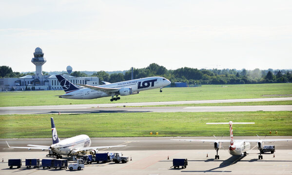 Warsaw, Poland. 15 April 2018. Passenger plane PLL LOT Boeing Dreamliner is flying up from runway of airport Chopin in Warsaw 