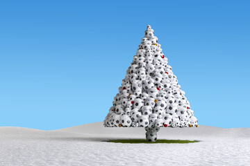 Winter break for soccer concept: A snow covered christmas tree made from soccer balls standing in a...