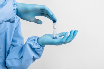 Hourglass in the doctor's hand. Medicine and time concept