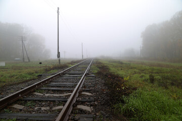 Obraz premium empty railroad in fog