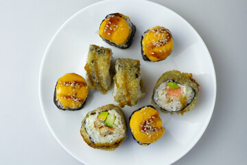 sushi rolls on a plate