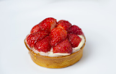 raspberry cheesecake on a white background