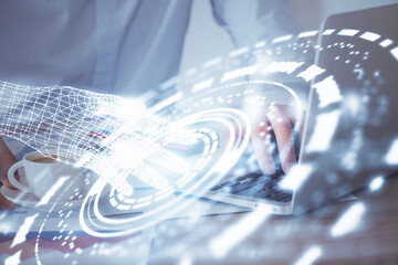 Double exposure of data internet theme hologram with man working on computer on background. Concept...