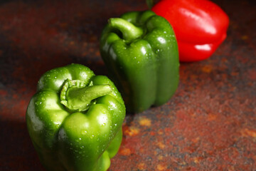 Fresh bell peppers on grunge background