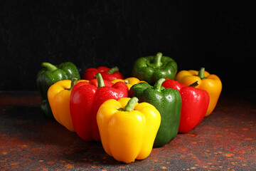 Fresh bell peppers on grunge background
