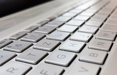 laptop keyboard with latin letters close up