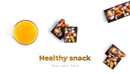 Fototapeta na wymiar Orange juice and raw chocolate sweets with nuts and fruits. Long header banner format. Panorama website header banner. High quality photo