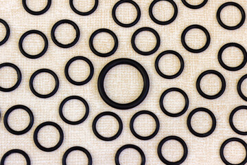 A set of rubber gaskets (O-rings) for pneumatic and hydraulic mechanisms of different diameters.