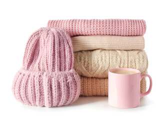 Stylish winter clothes on white background