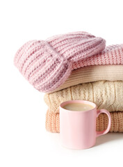 Stylish winter clothes on white background