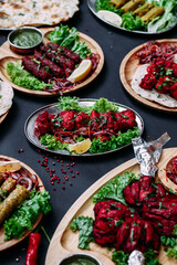 Indian cuisine dishes on black background