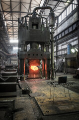 Steel ingot in hydraulic forging press