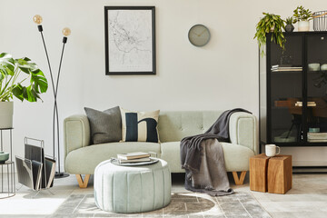 Unique loft interior with green comfortable sofa, design furniture, mock up poster map, carpet,...