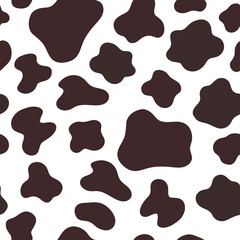 Seamless pattern with cow spots. Vector graphics.
