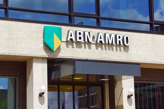 Groningen, the Netherland - July 26, 2020: ABN AMBRO bank sign against a partly clouded sky.