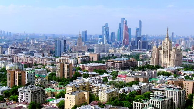 Moscow, Russia. Aerial panoramic view of the downtown, soviet high-rise buildings and Moscow city skyscrapers Drone flying over the amazing cityscape.
