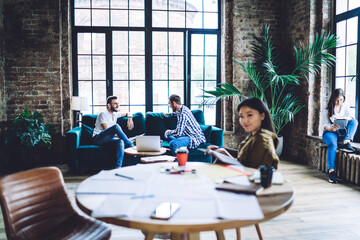 Diverse colleagues spending time in loft office
