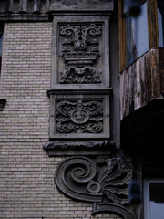 
stucco decoration element on the street in autumn