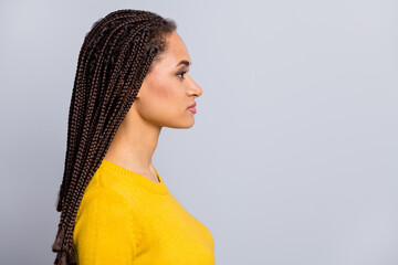 Profile side photo of young attractive afro american woman confident look empty space isolated over...