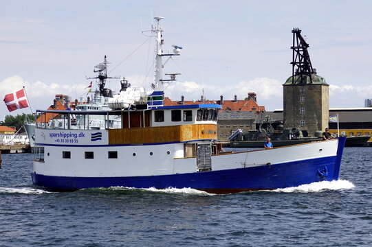 Copenhagen, Denmark - July 20, 2019: Cruise ship M/V Lang&oslash; sailing in the harbor of Copenhagen.