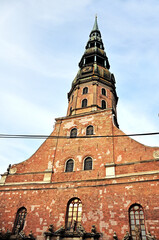 Fototapeta premium Spire of St. Peter's Church in the center of Old Riga