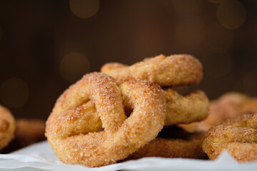 Pretzel cookies with sugar on a Christmas background. Sugar cookies.
