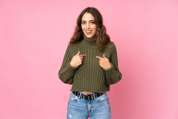 Young woman over isolated pink background with surprise facial expression