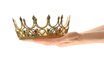 Woman holding beautiful golden crown on white background, closeup. Fantasy item