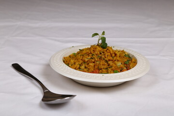 Poha (Pohay), Chewda with vegetables in it.