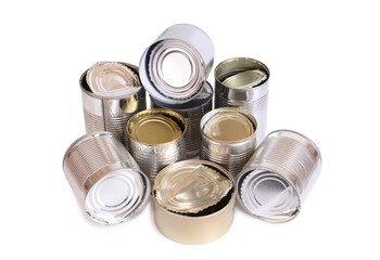 Heap of old empty cans on a white background. Isolated objects
