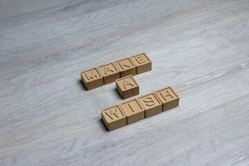 make a wish wish list desktop background New year holiday dream top view wooden letters checklist