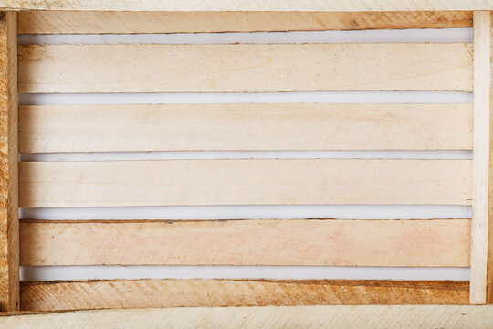 Texture of the slats of an Empty Wooden box for vegetables and fruits. In full screen