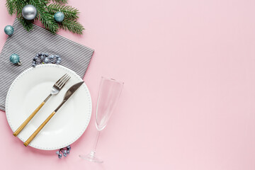 Christmas dinner concept with empty plate and glasses. Top view, flat lay