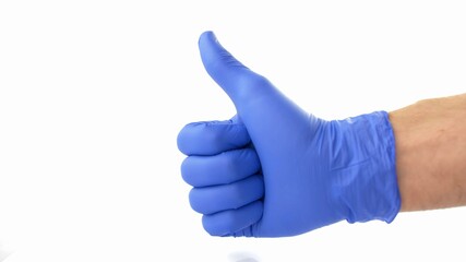 Thumbs Up Signal Shown in Blue Protective Surgical Gloves on White Background