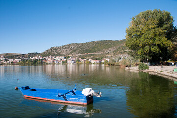 Boat near the shore of Lake Orestiada in Greece, the city of Kastoria
