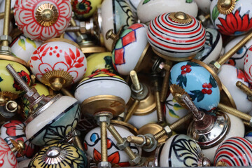 Collection of old fashioned vintage door knobs on display in a market