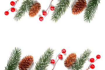 Fototapeta na wymiar Christmas composition. Branches of a Christmas tree and red berries on a white background. Flat lay, top view, copy space