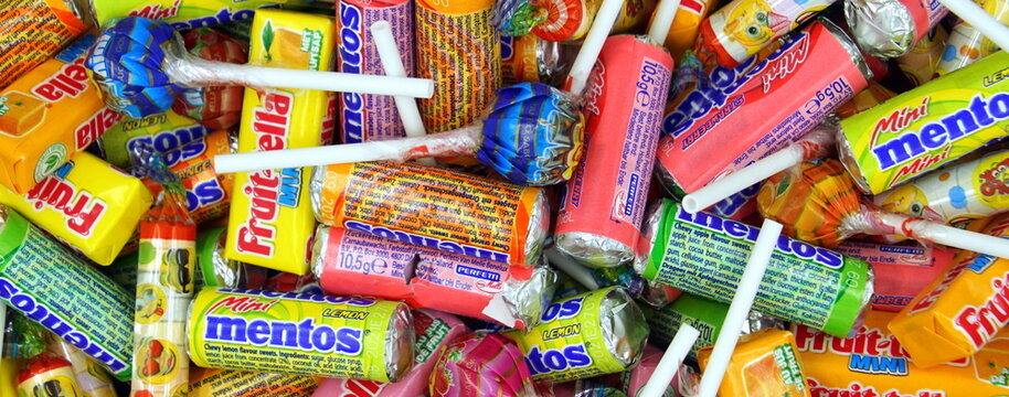 Amsterdam, the Netherlands - November 11, 2018: Mini candy mix with different types of sweets from Fruittella, Chupa Chups, Mentos, Look-O-Look and Haribo.