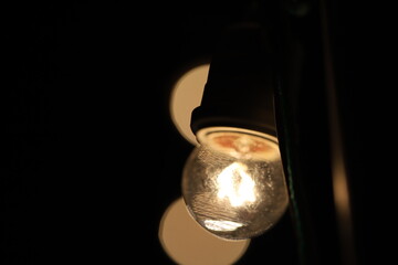 A light bulb illuminating at night