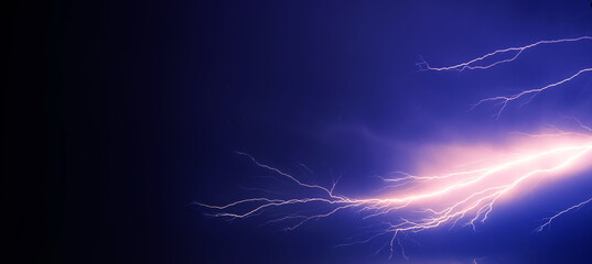 bright yellow lightning on blue dark sky
