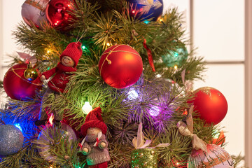 Decorated christmas tree. Close up hanging toys.