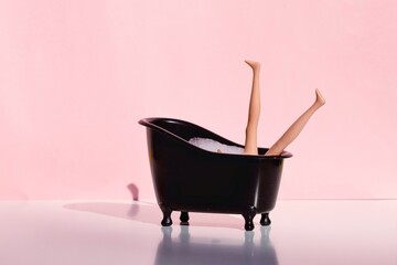 Doll taking a relaxing foam bath