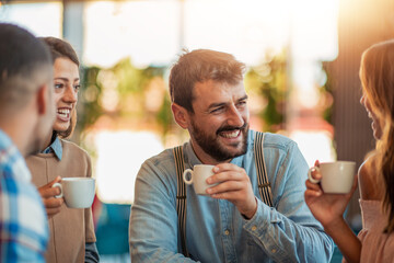 Friends enjoying in coffee